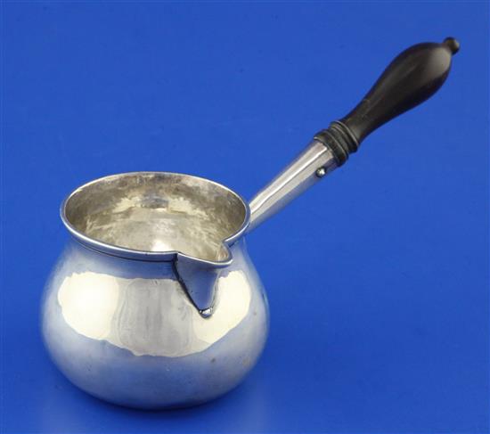 A George I silver brandy saucepan by William Darker, gross 2.5 oz.